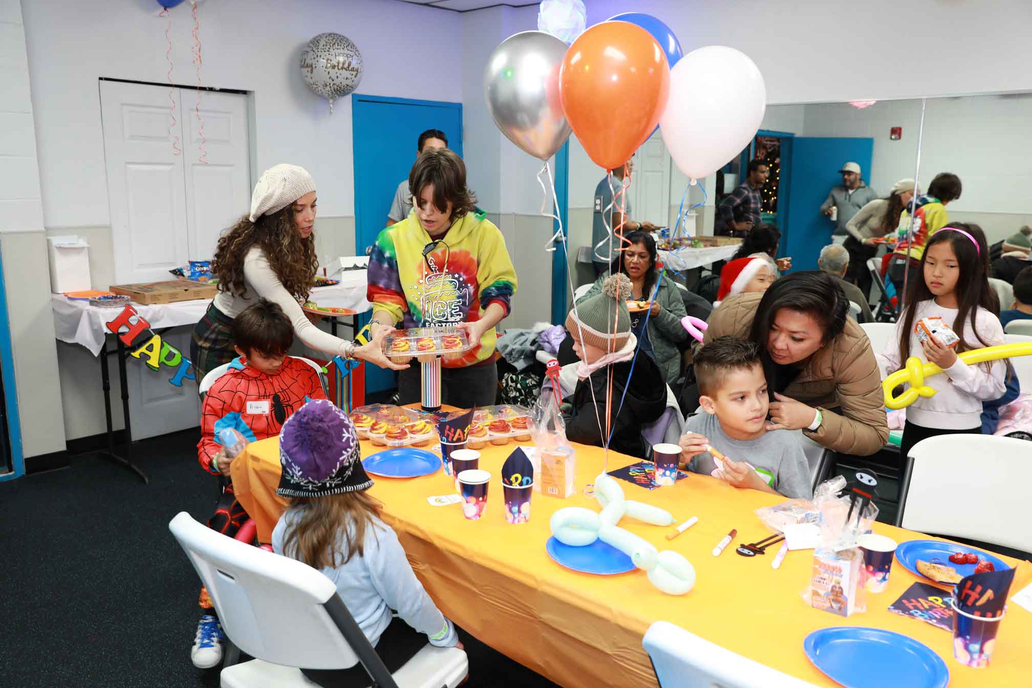Children Enjoying a unique birthday party experience with delicious pizza at the Ice Factory